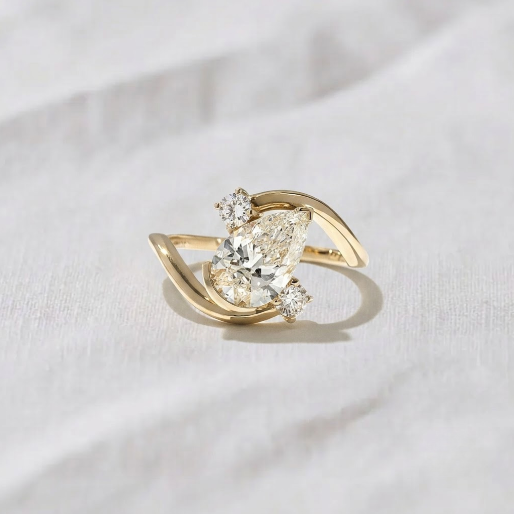 Pear Shape Three Stone Bypass Engagement Ring