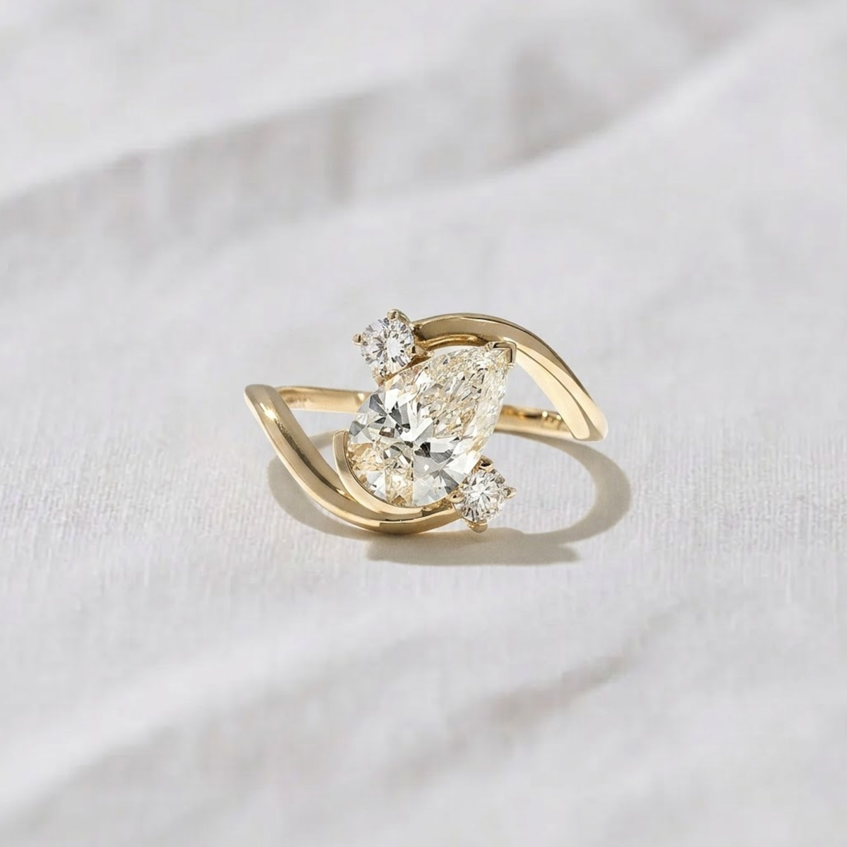 Pear Shape Three Stone Bypass Engagement Ring