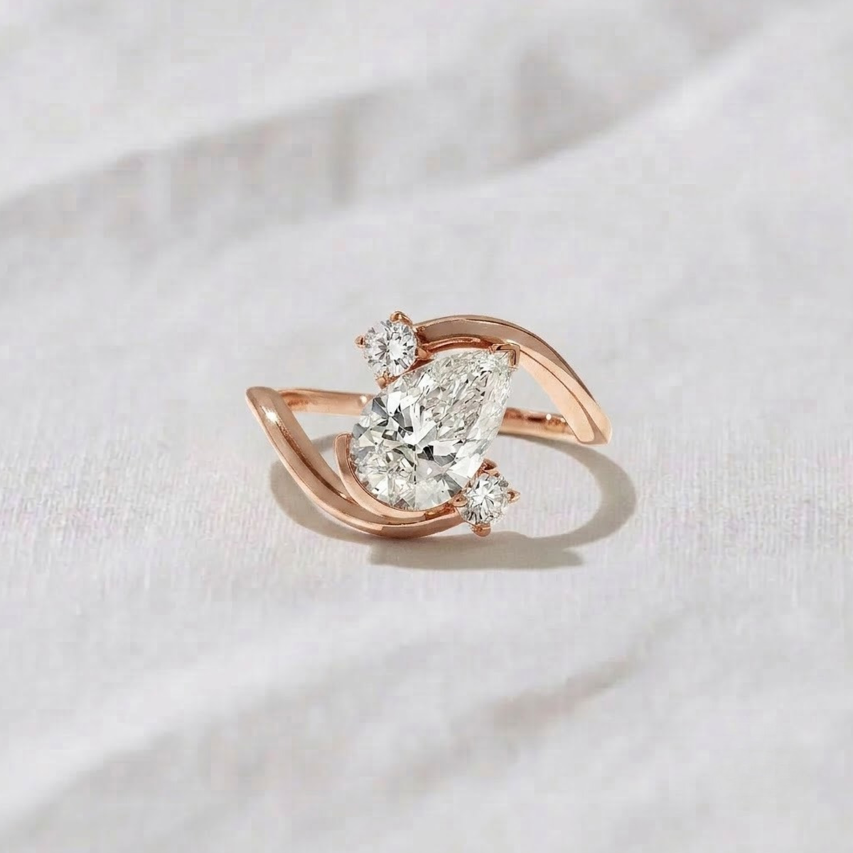 Pear Shape Three Stone Bypass Engagement Ring