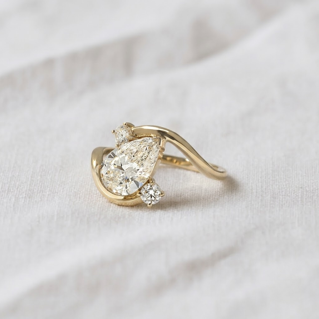 Pear Shape Three Stone Bypass Engagement Ring
