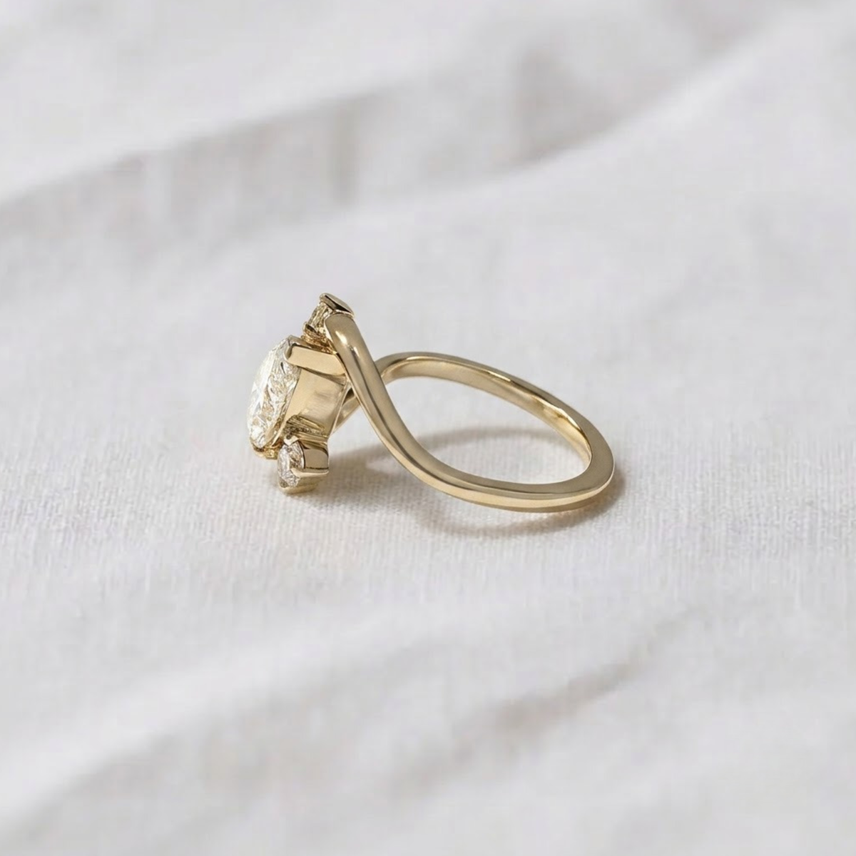 Pear Shape Three Stone Bypass Engagement Ring