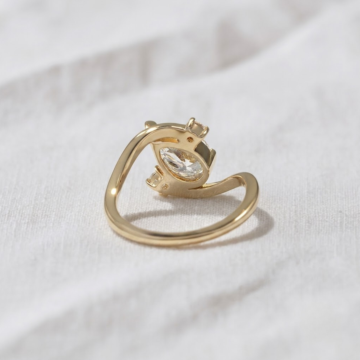 Pear Shape Three Stone Bypass Engagement Ring
