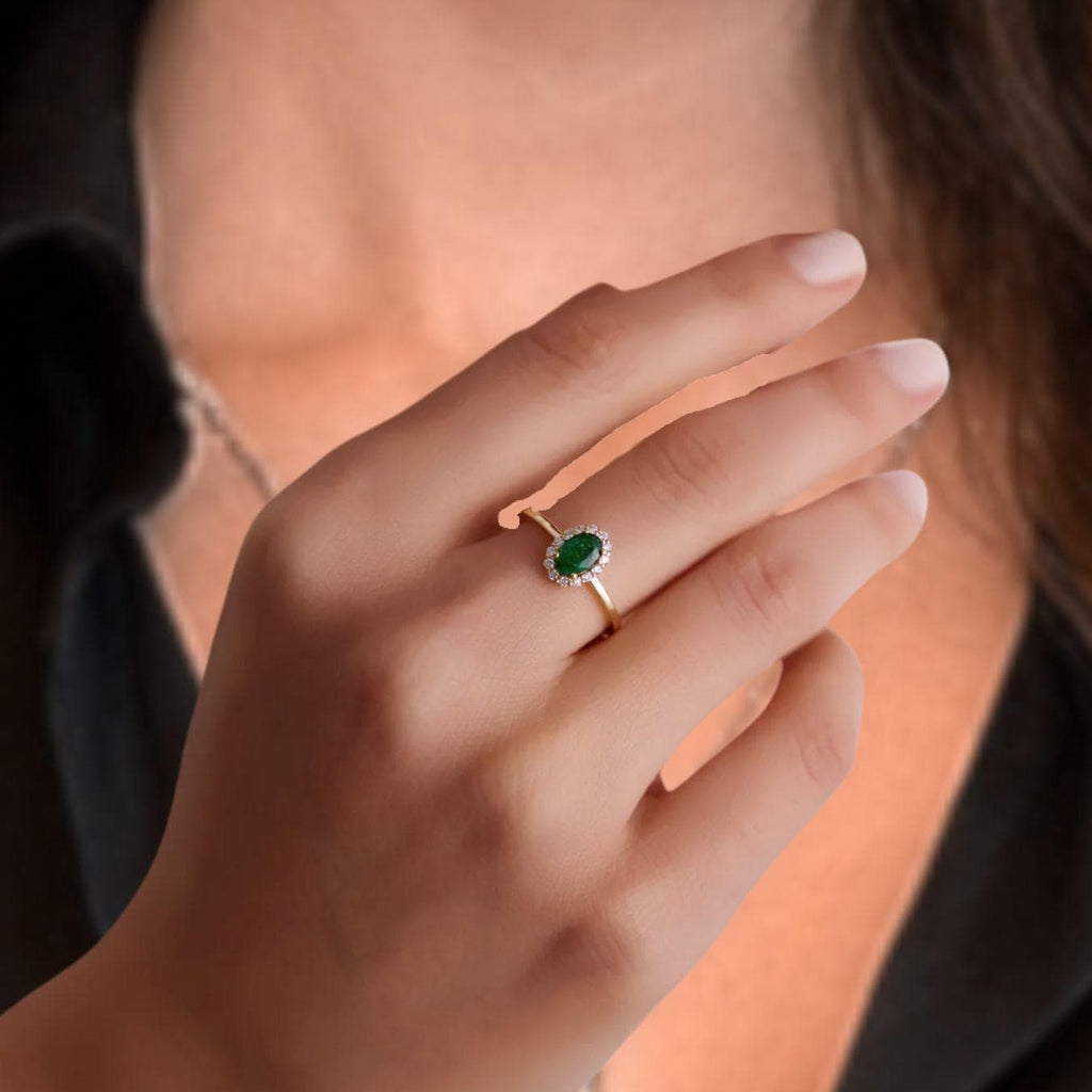 14K Classic Oval Cut Emerald Ring with Surrounding Lab Grown Diamond