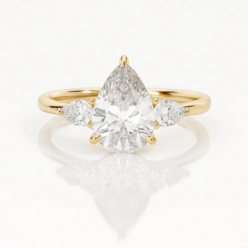 14K Gold Pear Shaped Lab Grown Diamond Three Stone Wedding Ring