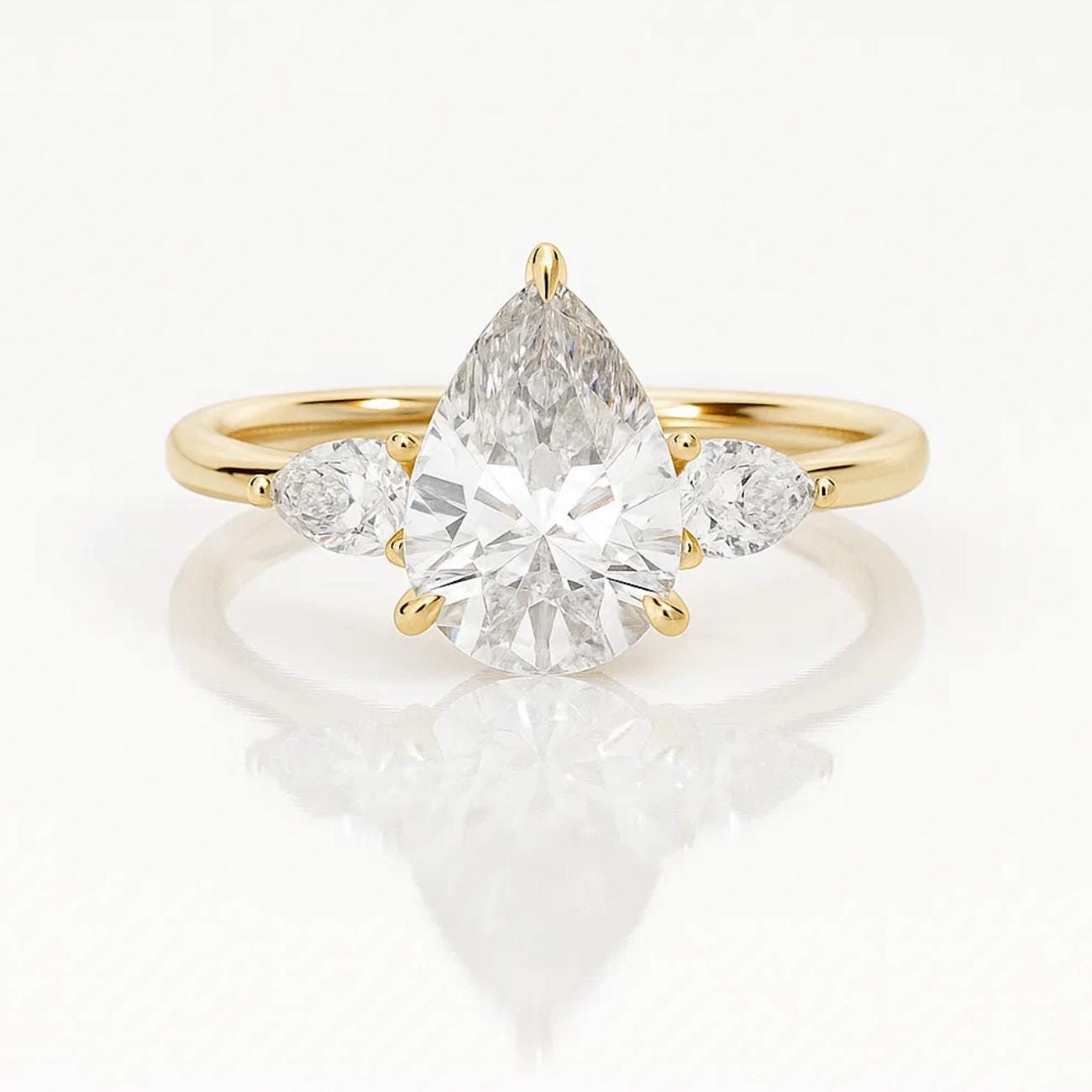 14K Gold Pear Shaped Lab Grown Diamond Three Stone Wedding Ring