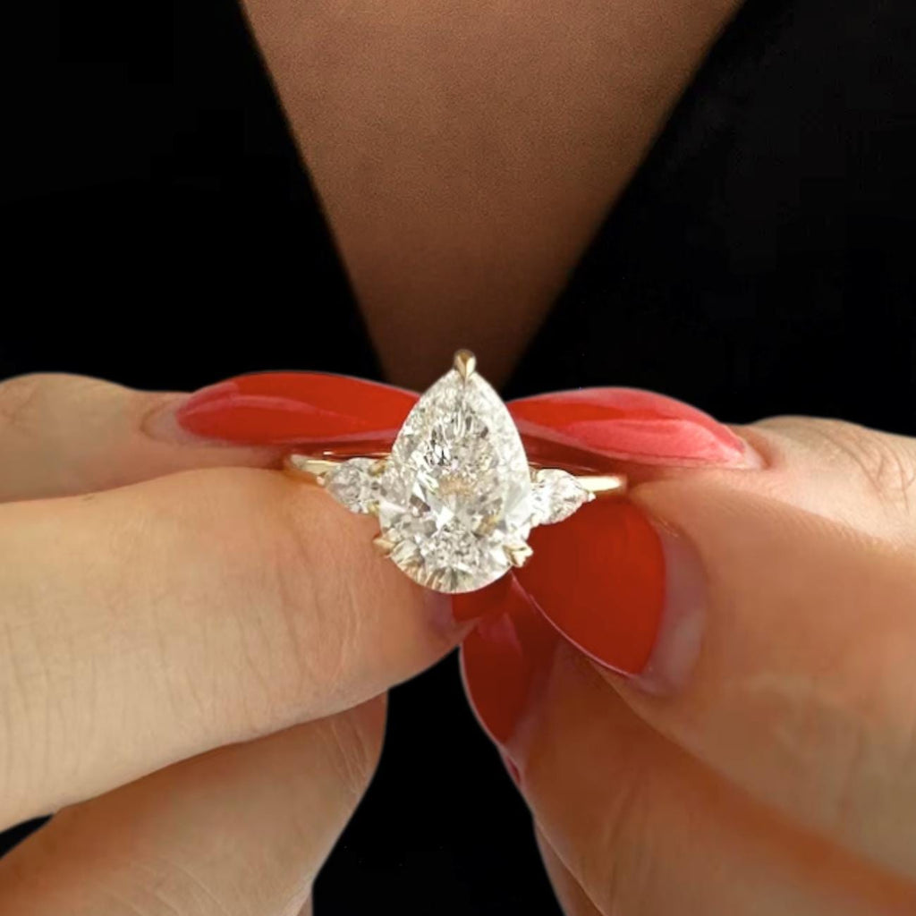 14K Gold Pear Shaped Lab Grown Diamond Three Stone Wedding Ring