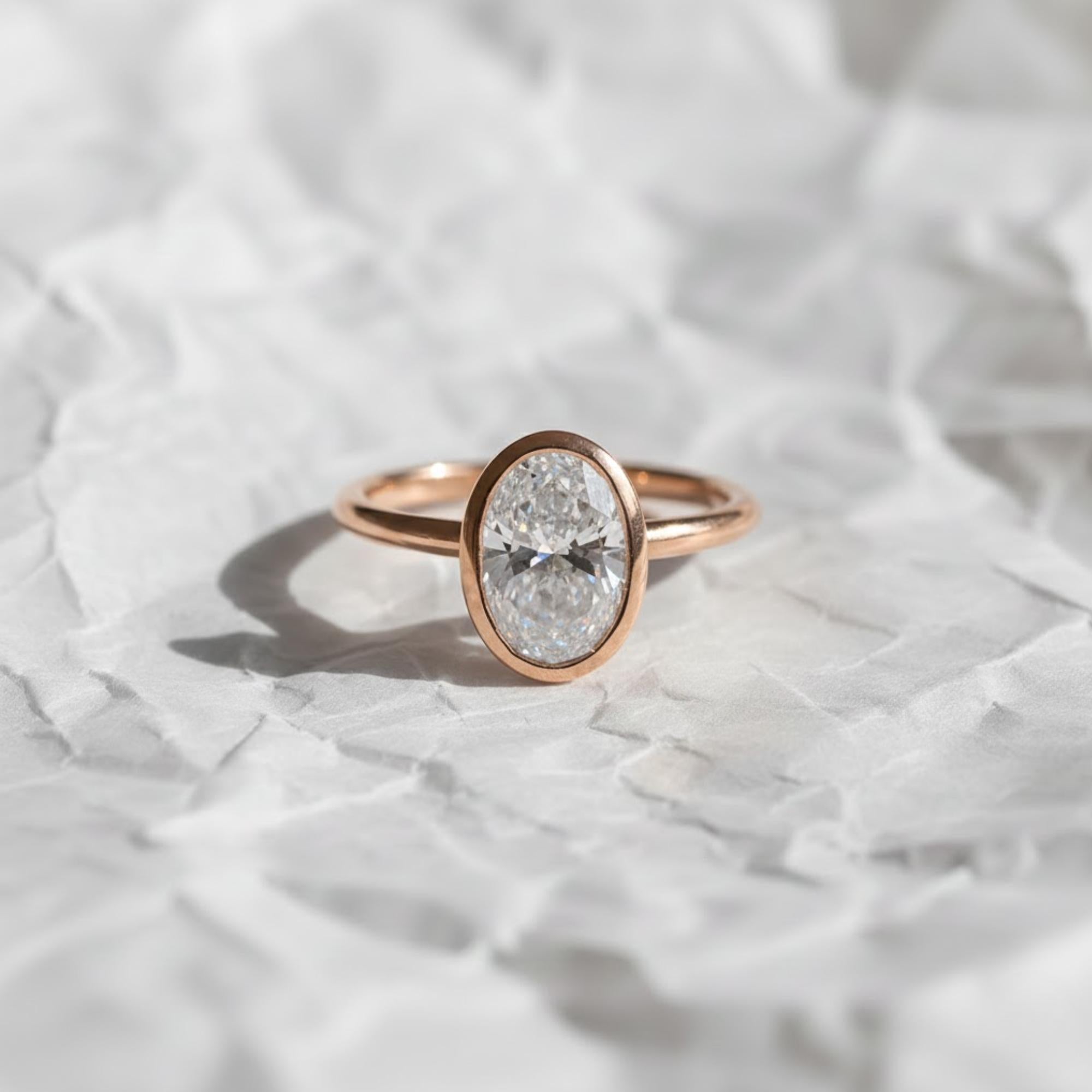 2 Carat IGI Certified Oval Cut Lab Grown Diamond Bezel Set Solitaire Engagement Ring 14K Yellow Gold