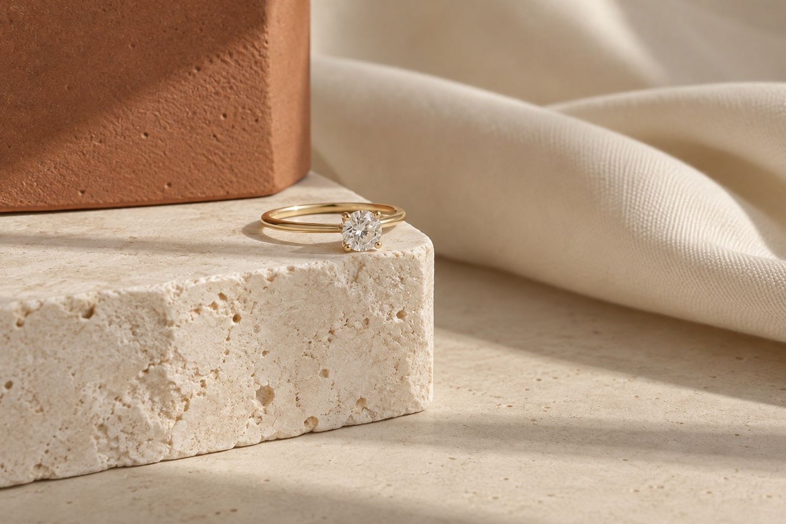 ÉLYSÉA campaign ring on ivory stone with terracotta